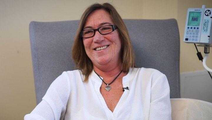 A woman in an infusion center