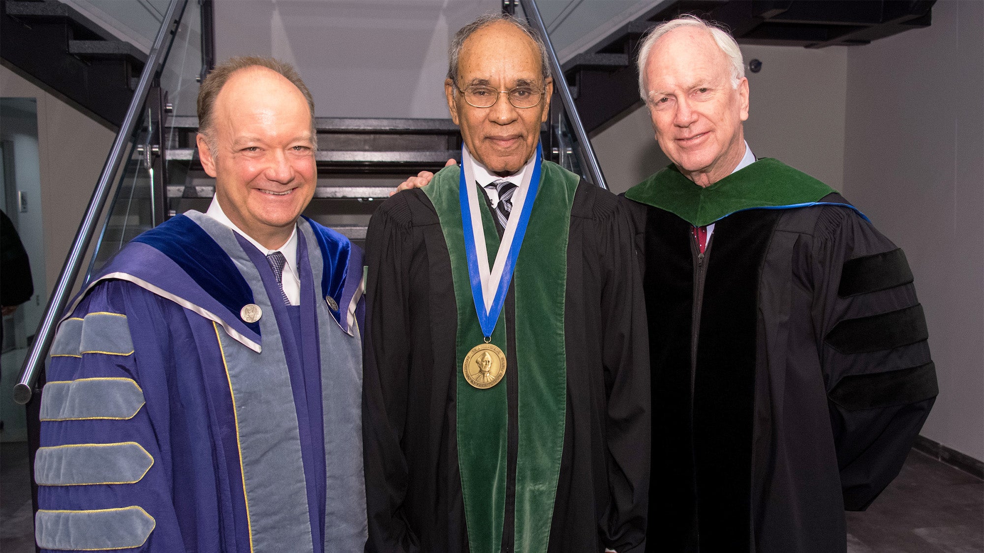 President DeGioia, Harold Freeman and Dr. Healton stand together