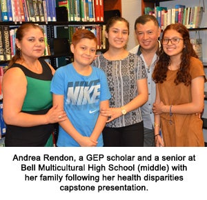 Andrea Rendon, a GEP scholar and a senior at Bell Multicultural High School(middle) with her family following her health disparities capstone presentation.