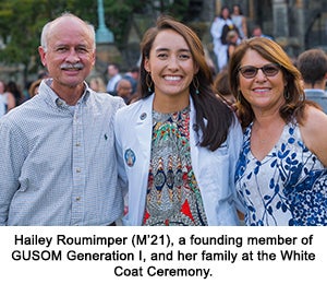 Hailey Roumimper (M’21), a founding member of GUSOM Generation I, and her family at the White Coat Ceremony.