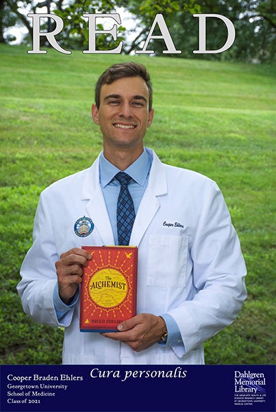 Cooper Braden Ehlers (M'21) with his book selection, “The Alchemist” by Paulo Coelho.