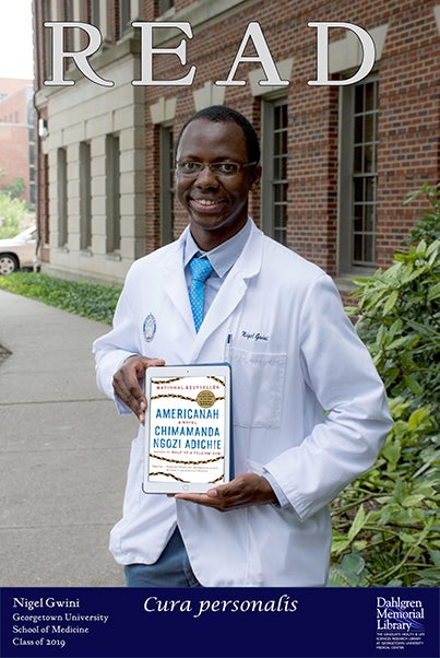 Nigel Gwini (M'19) with his book selection, “Americanah” by Chimamanda Ngozi Adichie