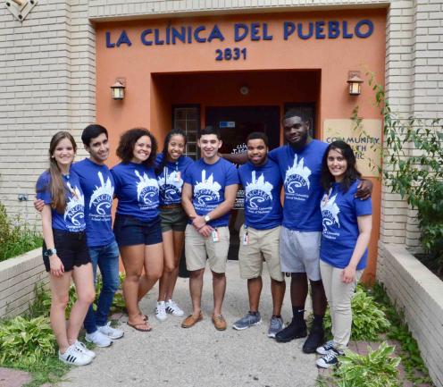 A group of students in the ARCHES program stand together