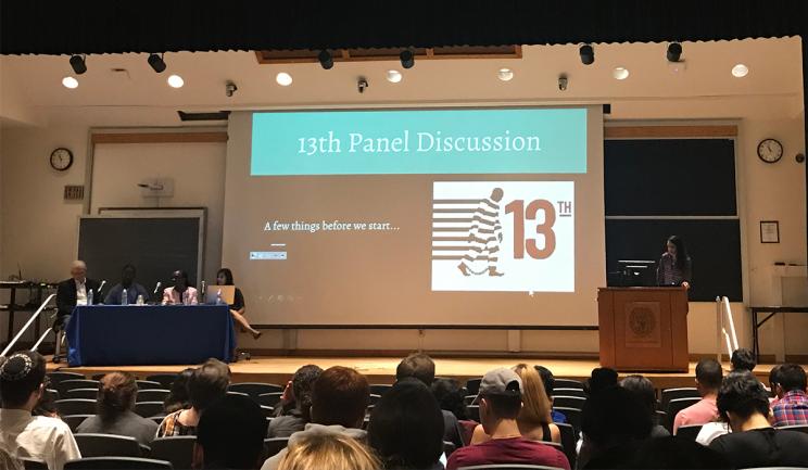 First-year students at the Georgetown University School of Medicine (GUSOM) prepare for a panel discussion on racism and the U.S. prison system after watching the documentary 