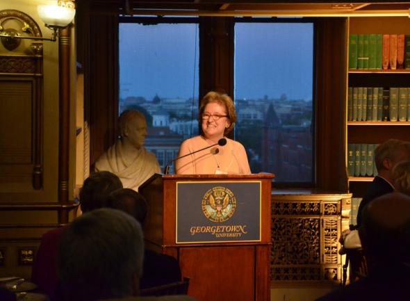 Dr. O'Donnell stands behind a podium