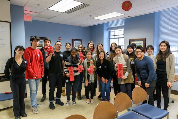 Students stand in a group