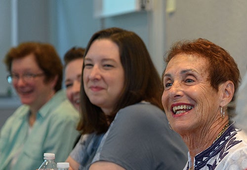 Margery London, Erin Price, Jamie Holloway and Shelley Brundage sit side by side at a table
