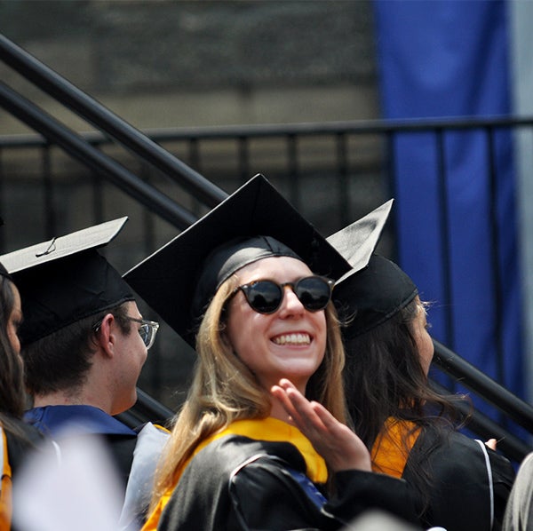 Carolyn Hofley amid others at graduation