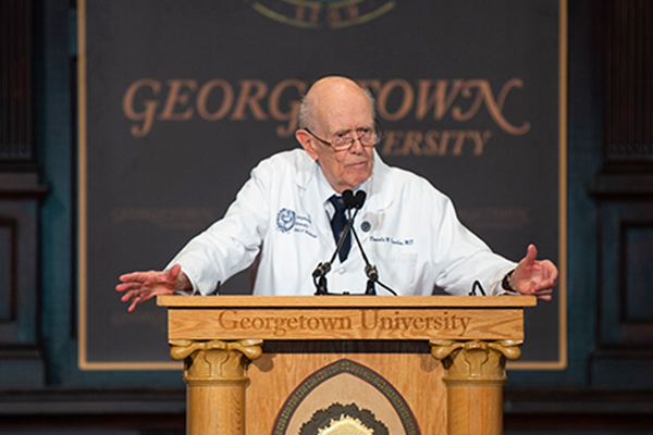 Dr. Knowlan stands at a podium