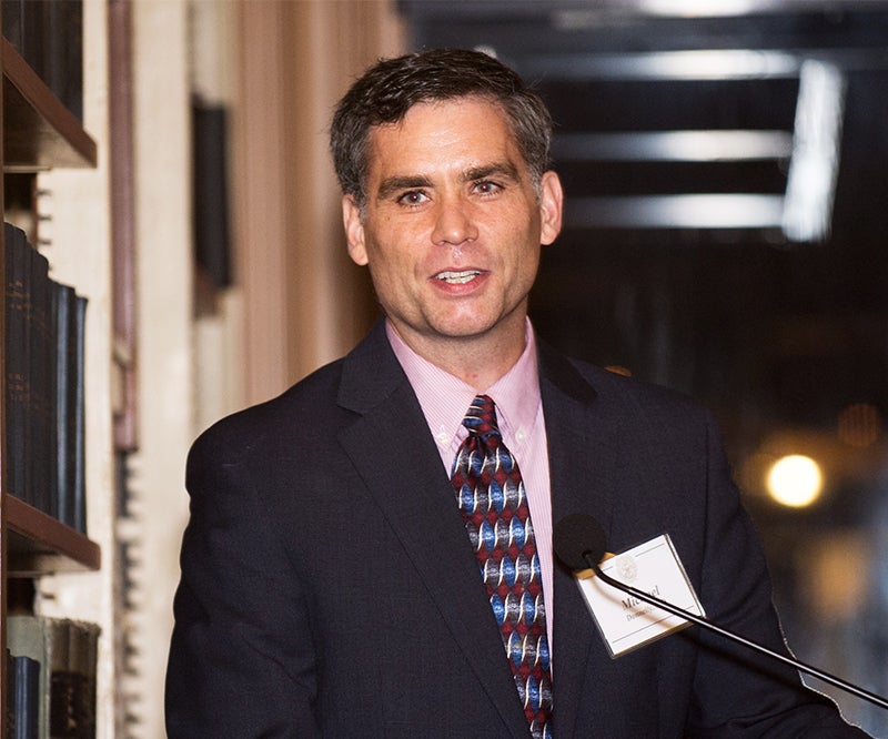 Michael Donnelly speaks at a podium