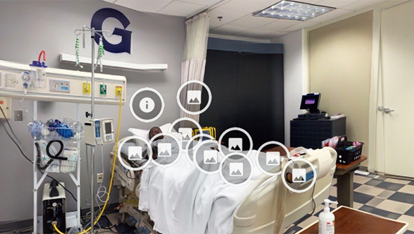 A screenshot from the web-based virtual simulation scenario shows bed and simulated patientbased