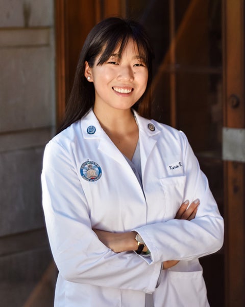 Medical student Karen Li in her white coat