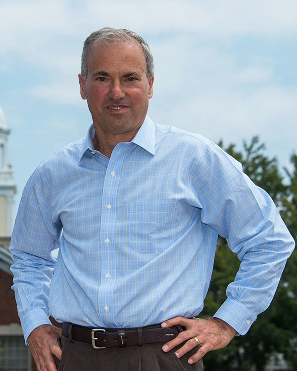 Jesse Goodman stands outdoors on campus