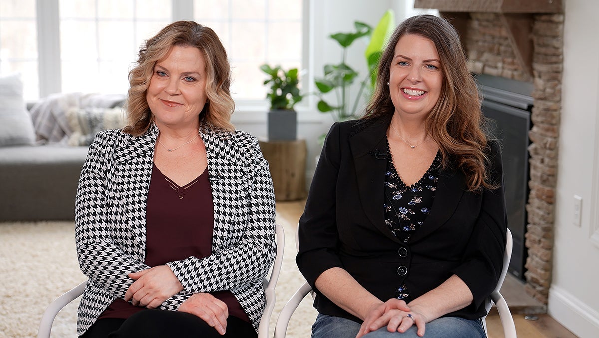 Shannon Walker and Courtney Howard sit side by side