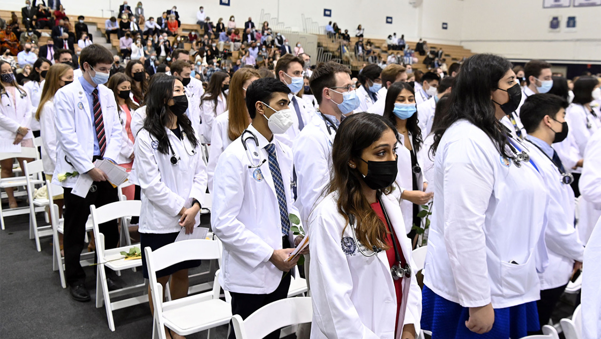 Students fill McDonough Arena for their in-person White Coat ceremony