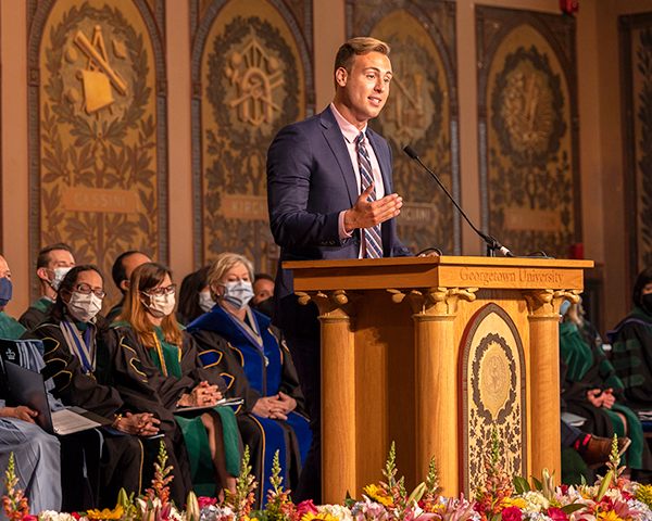 Michael Markel speaks at a podium onstage