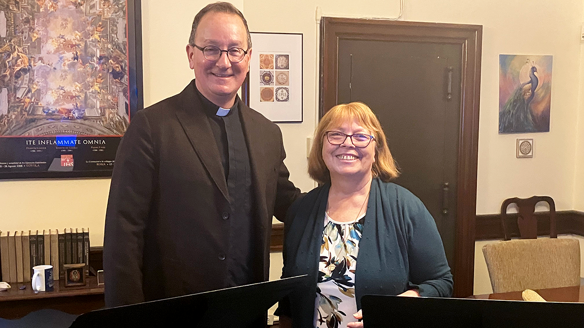 Father Bosco and Sister Celeste stand together prior to their presentation