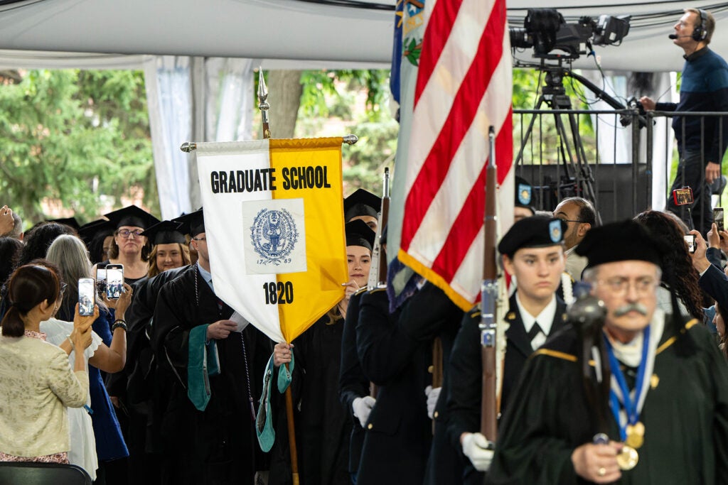 Graduate student process into their Commencement ceremony