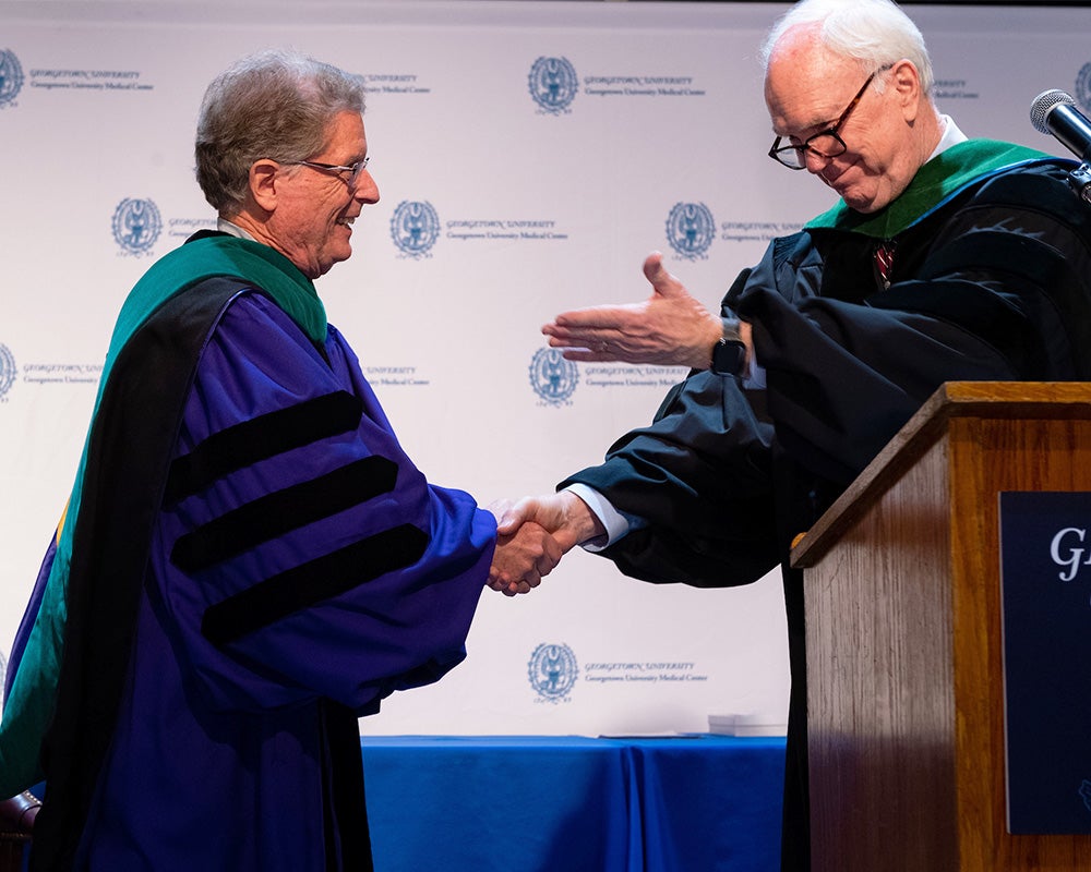 Dr. Healton shakes hands with Dr. Schlegel