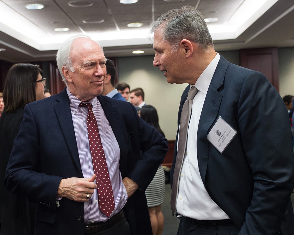 Dr. Healton and Dr. Weiner speak to each other at an event