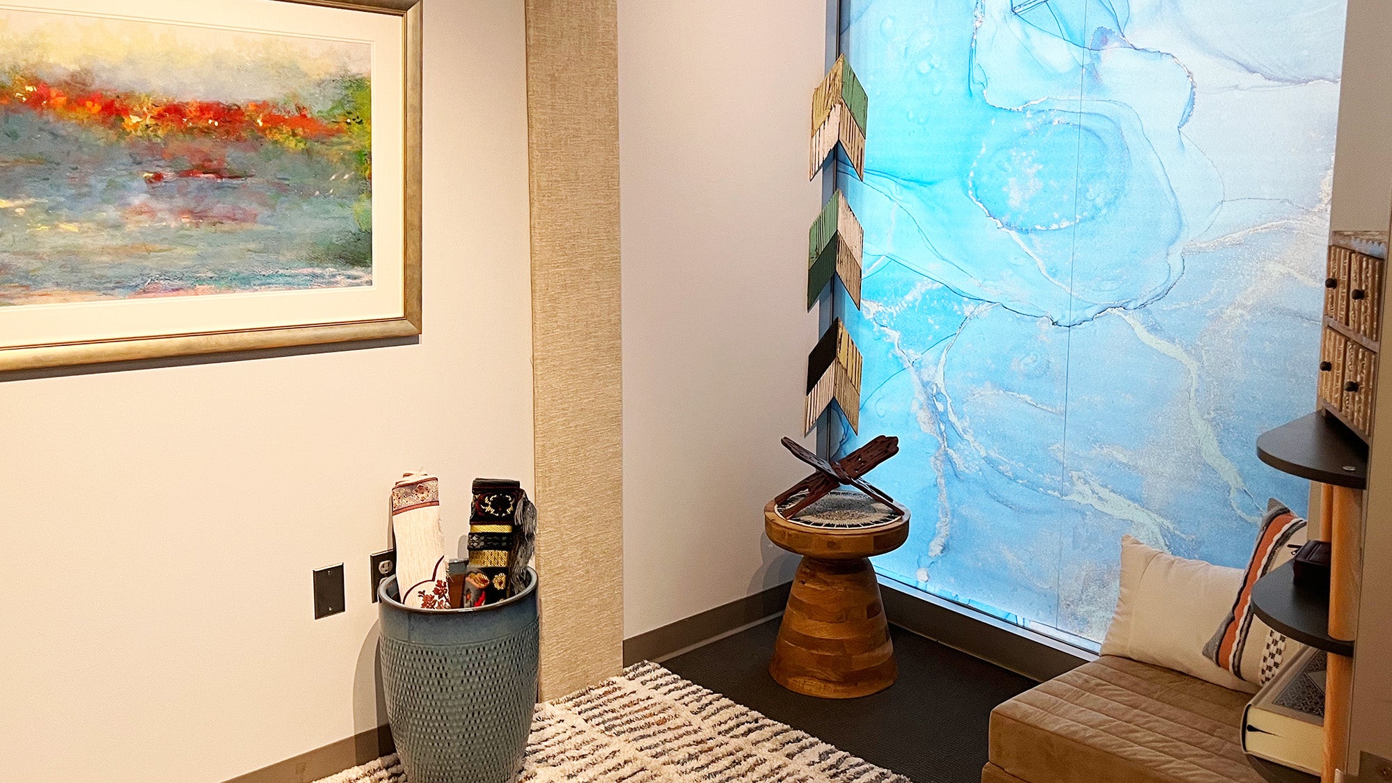 St. Mary's meditation room with soothing window treatments, cushions and tables and a rug