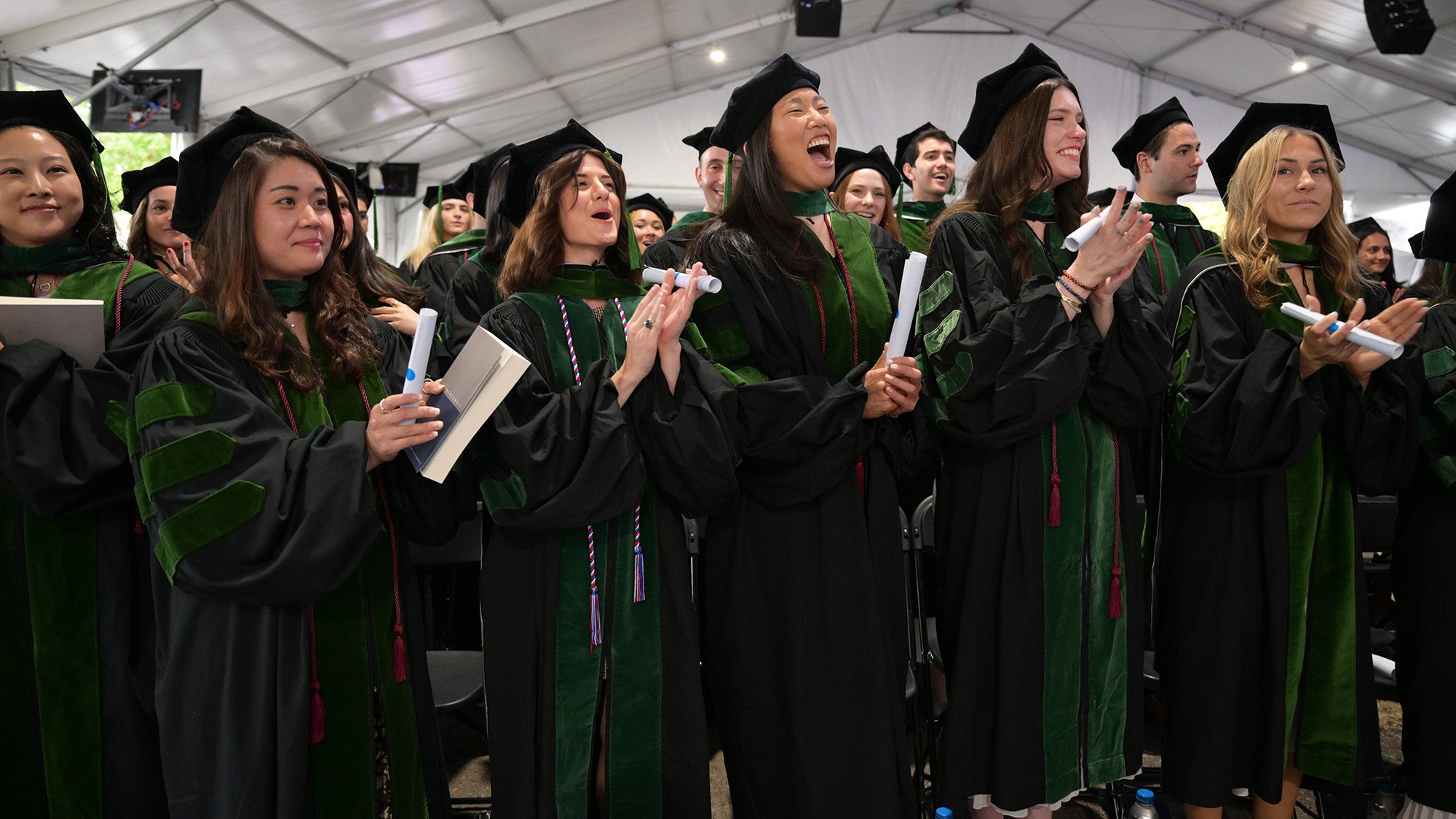 Jubilant students celebrate earning their medical degrees