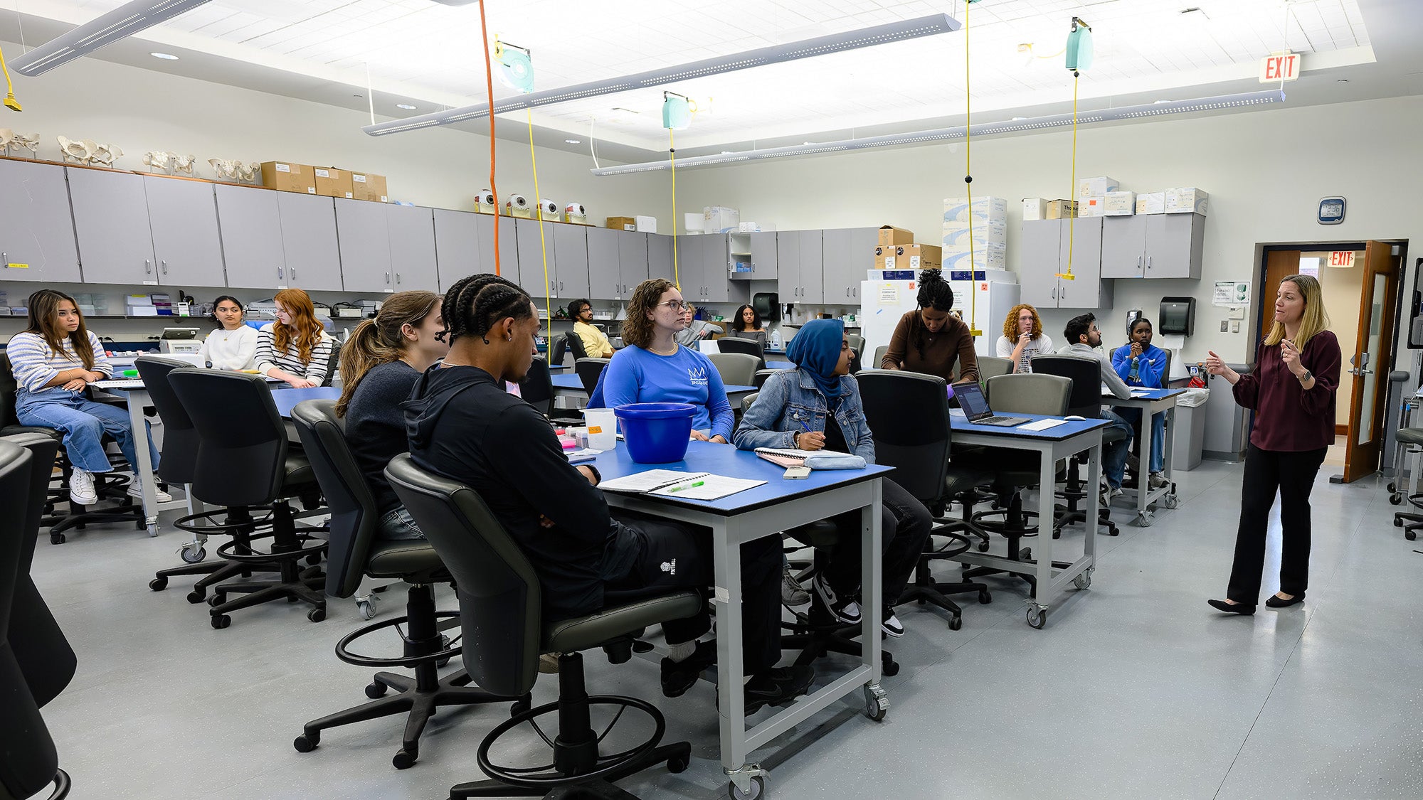 Dr. Laroque presents a lecture to her class in the Discovery Center