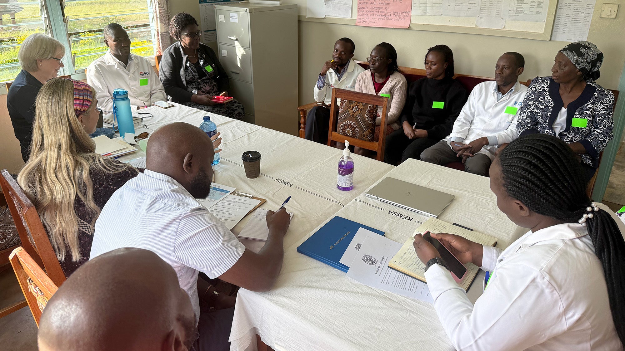 A PhD student from the BSON participates in a meeting in Kenya