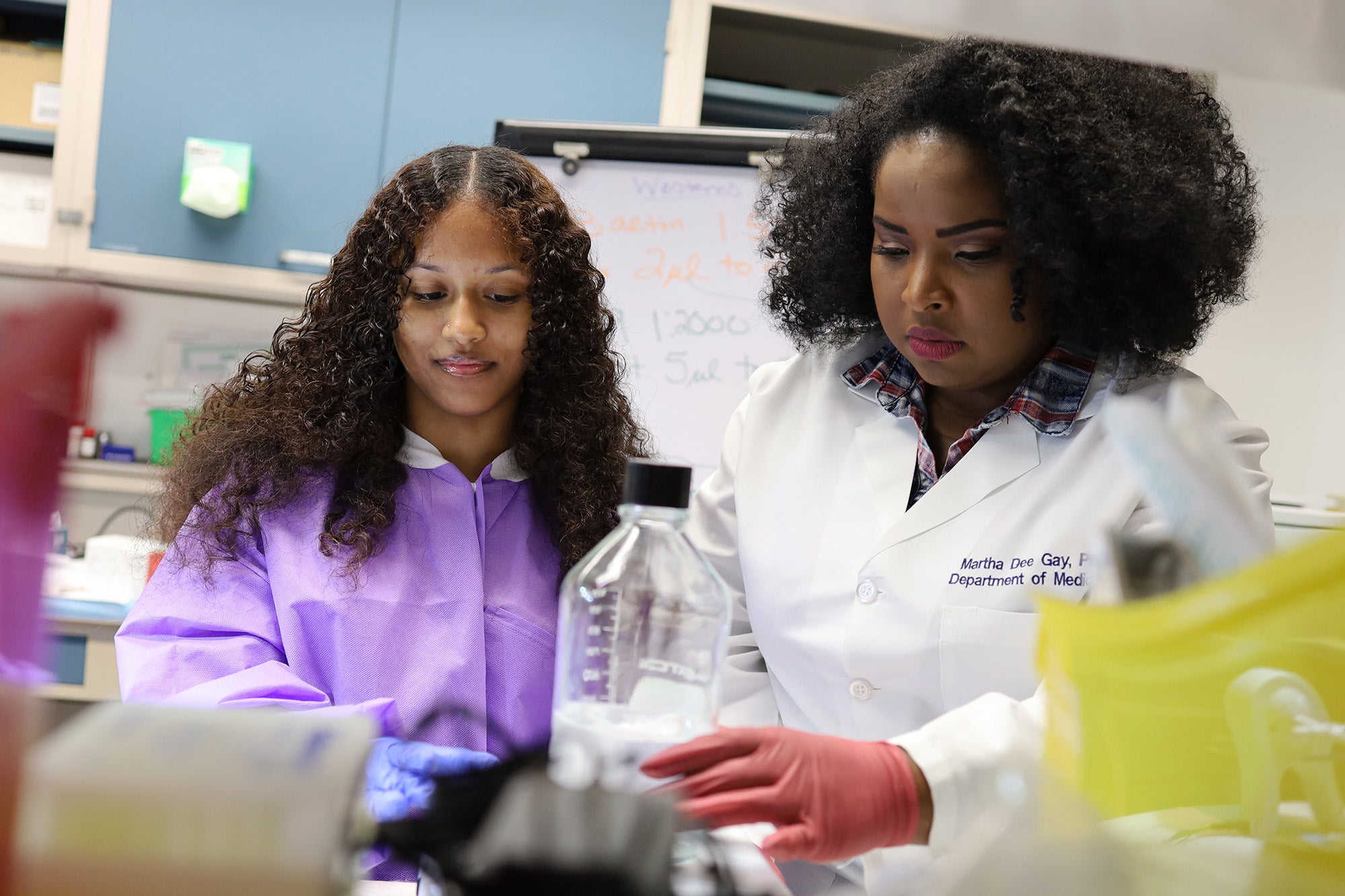 Dr. Martha Gay works with an undergraduate mentee